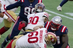 Wilson Has 3 Tds Before Injury, 49ers Crush Patriots 33 6