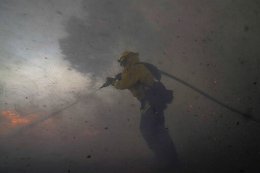 Ap Photos: Wind Whipped Wildfires Clobber California Again
