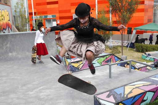 Bolivian Women Skateboard In Aymara Garb To Showcase Culture