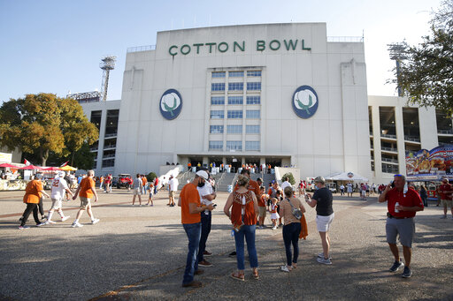 No Fair, Few Fans: Texas, Ou Play On Despite Different Feel