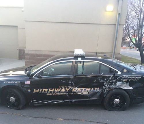 Troopers Unhurt After Patrol Vehicles Hit By Passing Truck
