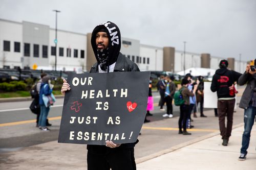 Fired Amazon Worker Sues Over Pandemic Working Conditions