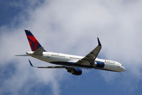 2 Delta Passengers Open The Door Of A Moving Plane And Slide Out (with A Dog) At Laguardia Airport