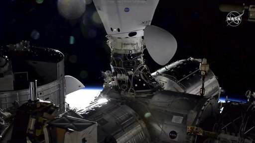 Spacex Capsules Parked Side By Side At Station For 1st Time
