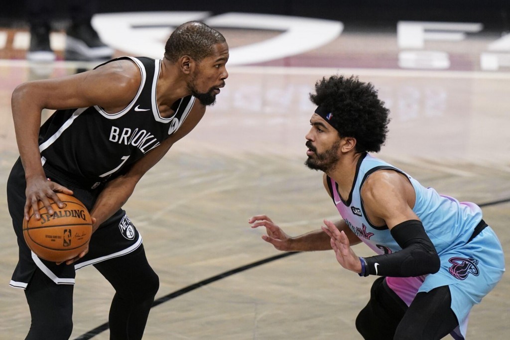Durant, Irving Help Nets Hold Off Adebayo, Heat 128 124