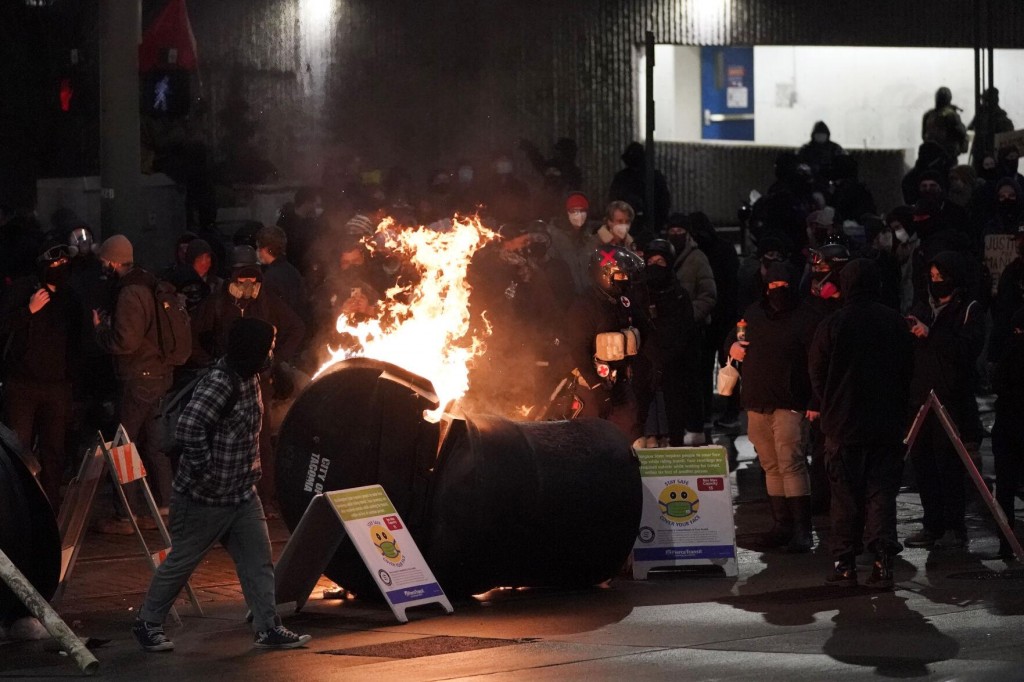Protest Erupts Over Police Car Driving Through Crowd