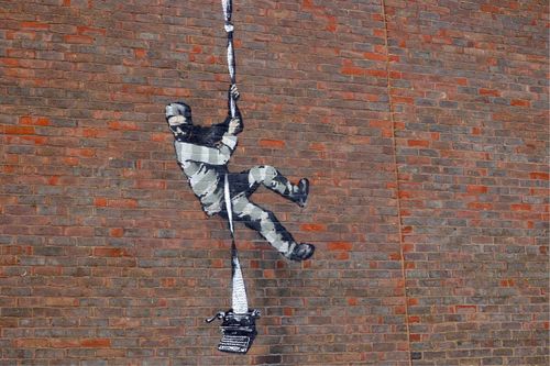 Banksy Confirms Prison Escape Mural Is His With Bob Ross Inspired Video