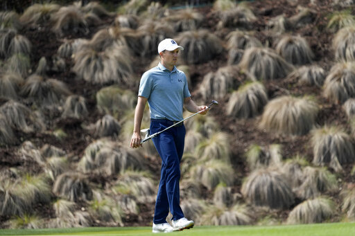 The Latest: Spieth Loses Last 2 Holes And Settles For A Tie