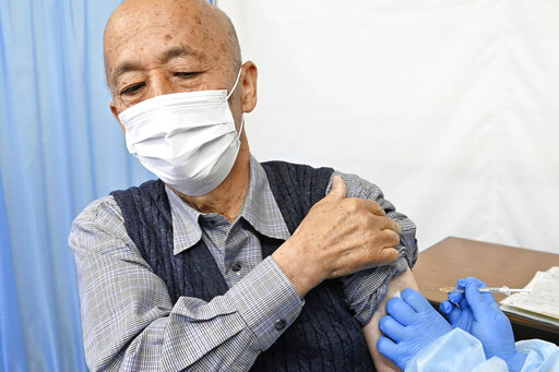 Tokyo Adopts Tougher Virus Rules, Starts Vaccinating Elders