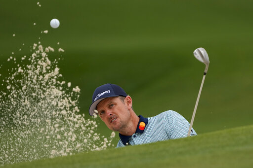 Masters Day 2: As Rose Wilts, A Pursuing Pack Closes In