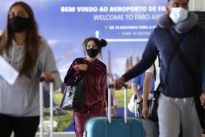 Vacation Redux: British Tourists Return To Portugal Beaches