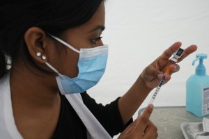 Aid Group Vaccinates Migrants As France Expands Virus Pass