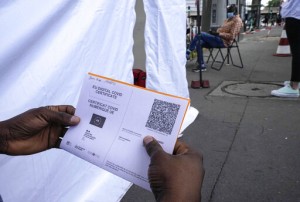 Aid Group Vaccinates Migrants As France Expands Virus Pass