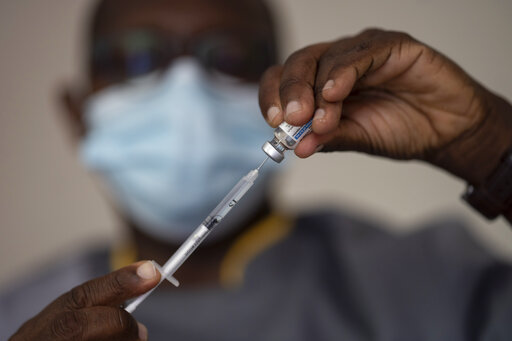 West African Health Officials Race To Vaccinate Amid Spikes
