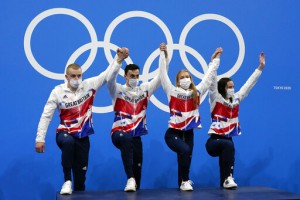 In Olympic First, Men, Women Swim Together In Wild Medley
