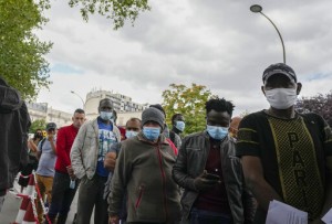 Aid Group Vaccinates Migrants As France Expands Virus Pass