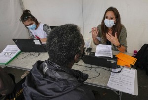 Aid Group Vaccinates Migrants As France Expands Virus Pass