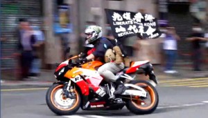 Hong Kong Protester Given 9 Year Term In 1st Security Case