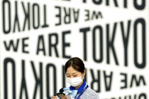 The Latest: Ark. Has New High For Hospitalizations For Covid