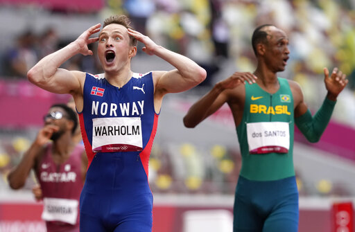 Warholm Crushes World Record In Fast, Fast Olympic Hurdles