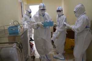 Rapid Virus Spread Through Indonesia Taxes Health Workers