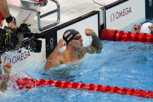 Milestone Medals In Pool, 100 Meter Dash On Tap At Olympics