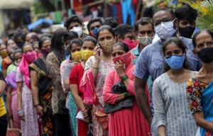 The Latest: Ark. Has New High For Hospitalizations For Covid