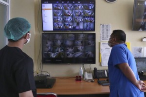 Rapid Virus Spread Through Indonesia Taxes Health Workers