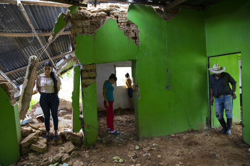 Their Town Wiped Out By A Mudslide, People Of La Reina Mourn