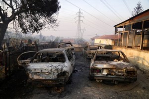 Firefighting Planes Resume Flights Over Fire North Of Athens
