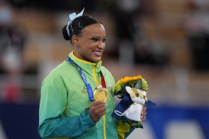 Milestone Medals In Pool, 100 Meter Dash On Tap At Olympics