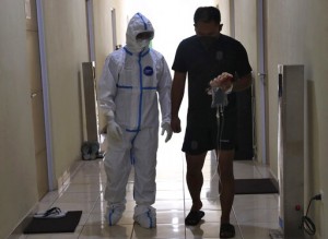 Rapid Virus Spread Through Indonesia Taxes Health Workers