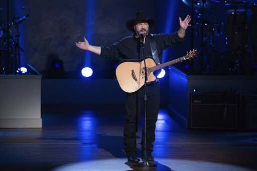 Garth Brooks Reassessing Stadium Tour Because Of Covid Surge
