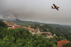 Forest Fires Rage In Greece; Blaze North Of Athens Rekindles