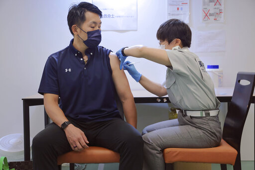 Japan To Limit Hospital Care As Covid 19 Cases Hit New High