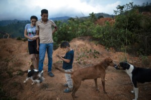 Their Town Wiped Out By A Mudslide, People Of La Reina Mourn
