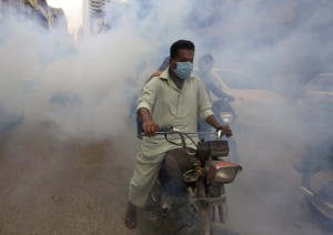The Latest: Hong Kong Updates Travel Rules To Fight Virus